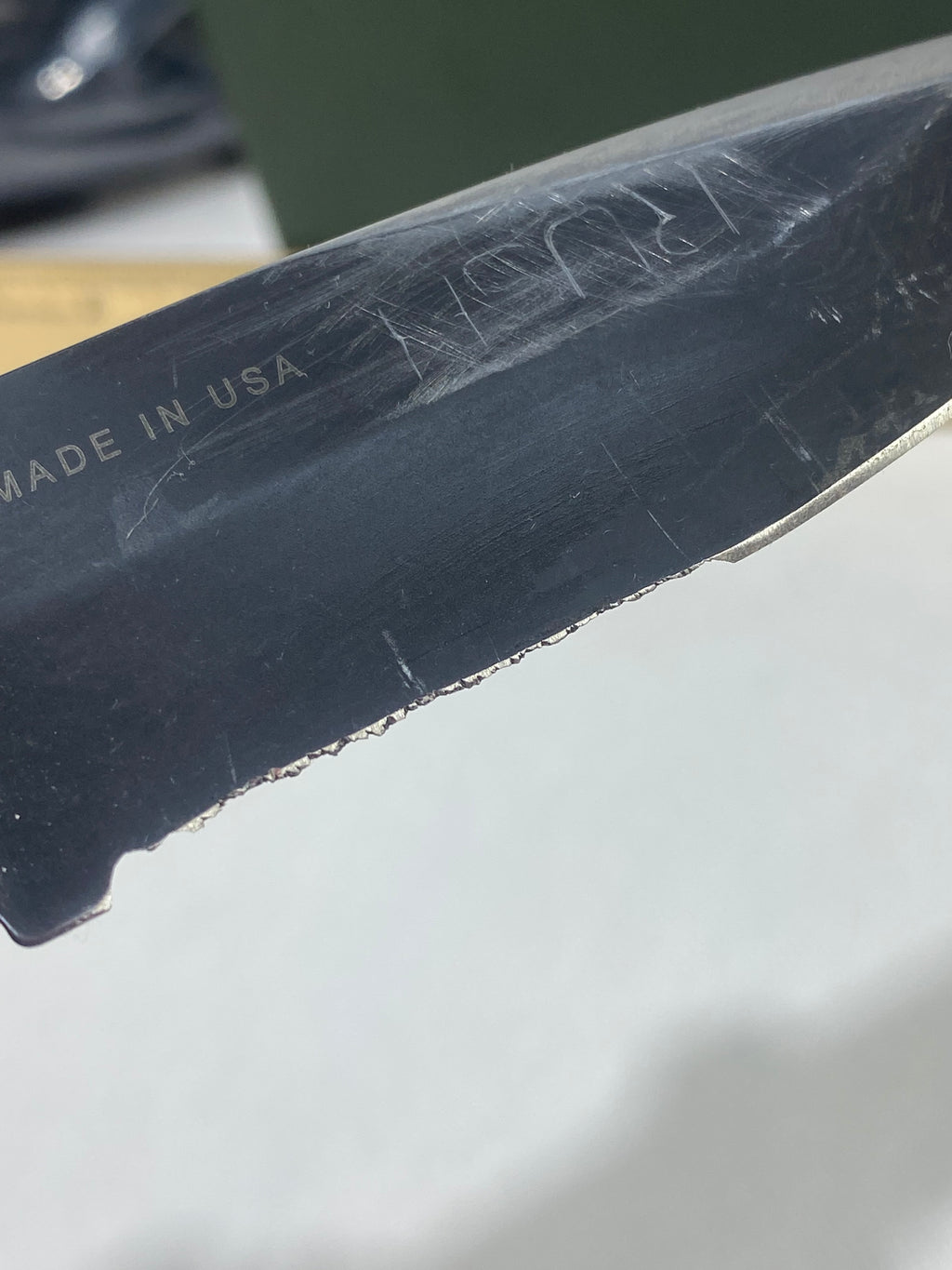 Gerber -85. 06. Light usage. Resharpened. A name is scratched into the blade. Needs Oil.