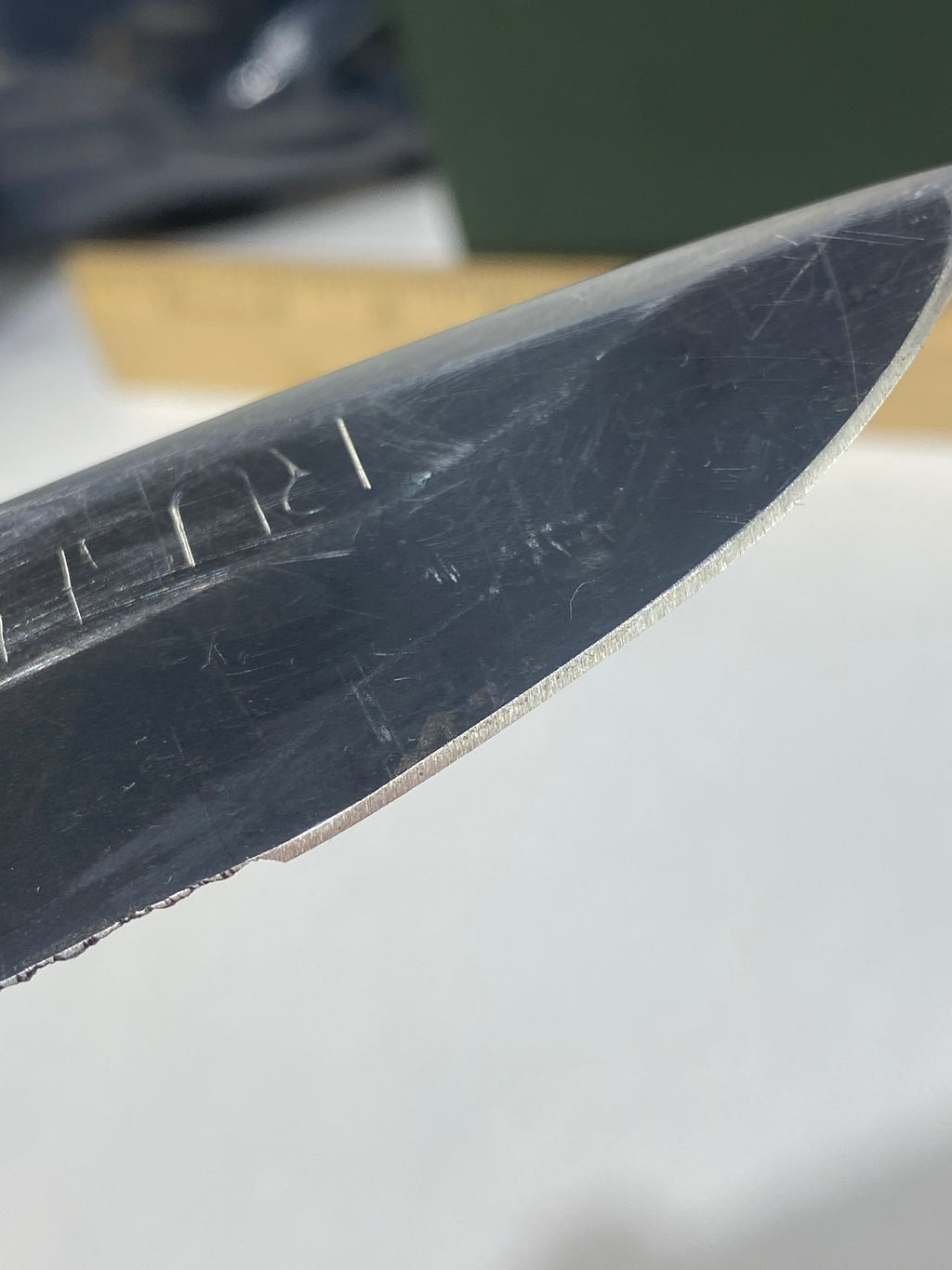 Gerber -85. 06. Light usage. Resharpened. A name is scratched into the blade. Needs Oil.