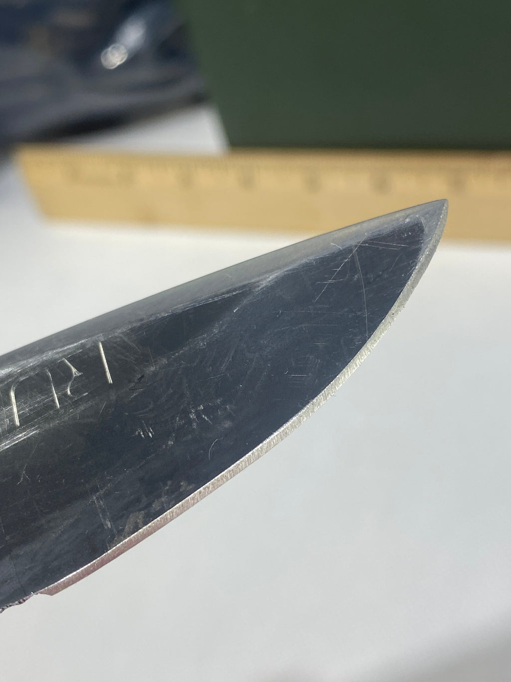 Gerber -85. 06. Light usage. Resharpened. A name is scratched into the blade. Needs Oil.