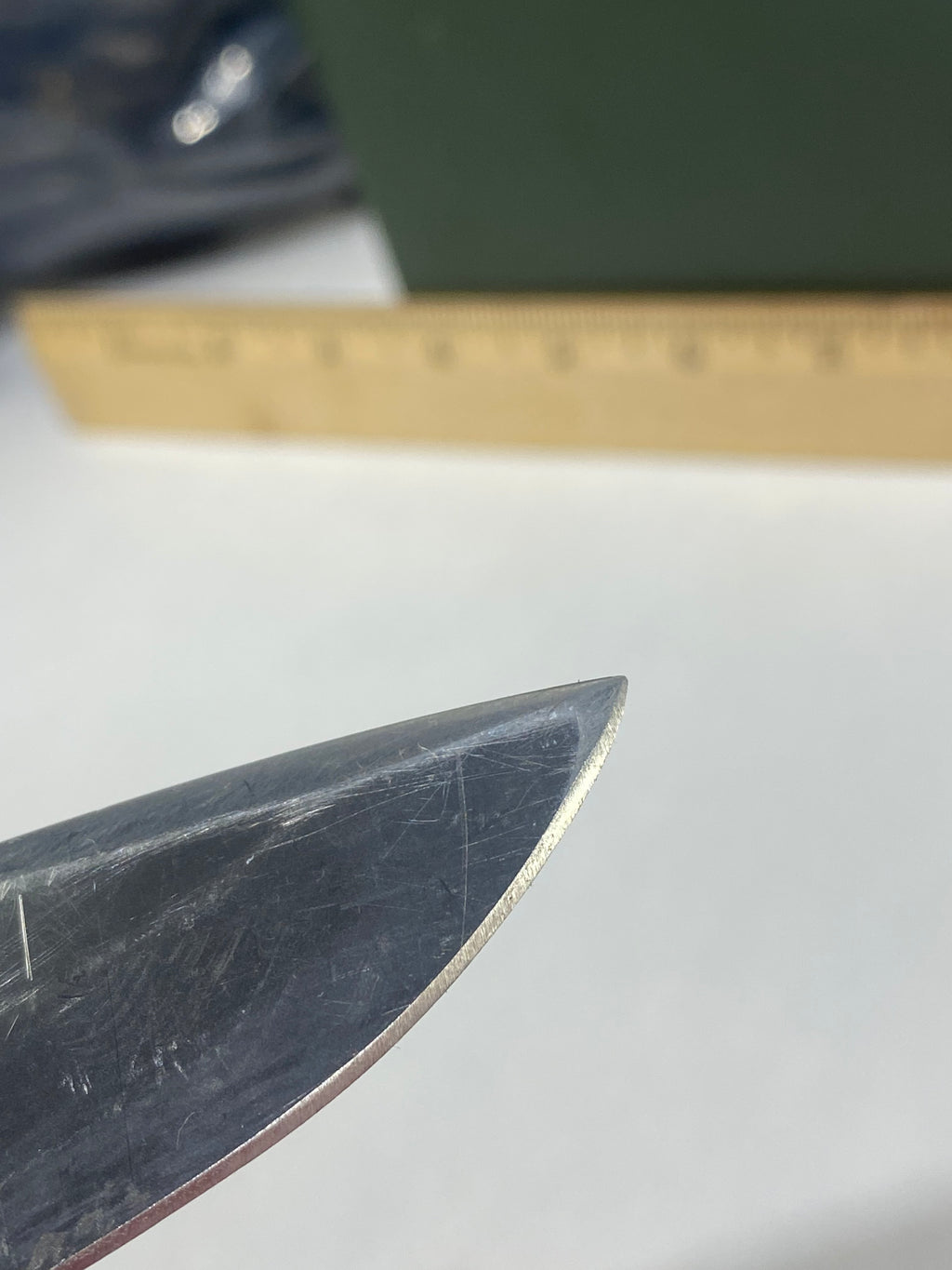 Gerber -85. 06. Light usage. Resharpened. A name is scratched into the blade. Needs Oil.