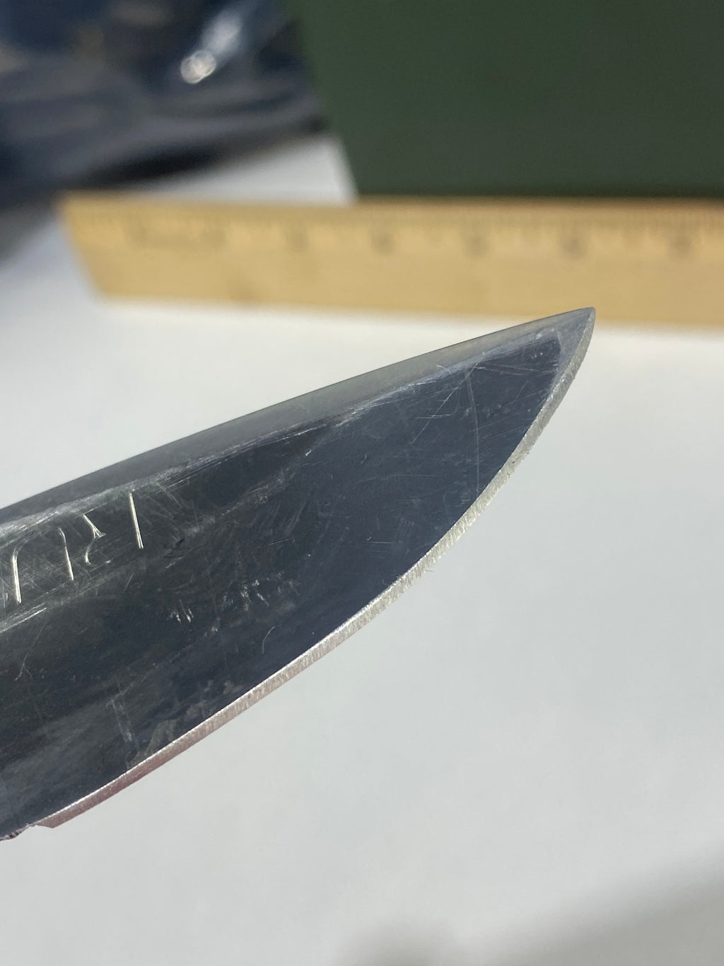 Gerber -85. 06. Light usage. Resharpened. A name is scratched into the blade. Needs Oil.