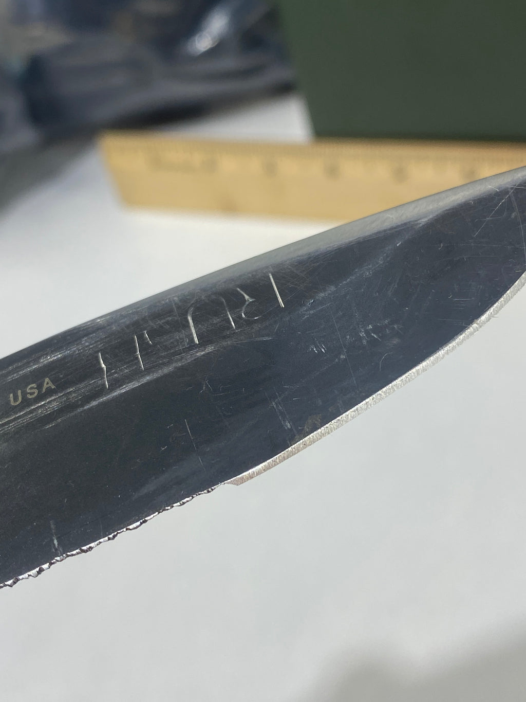 Gerber -85. 06. Light usage. Resharpened. A name is scratched into the blade. Needs Oil.
