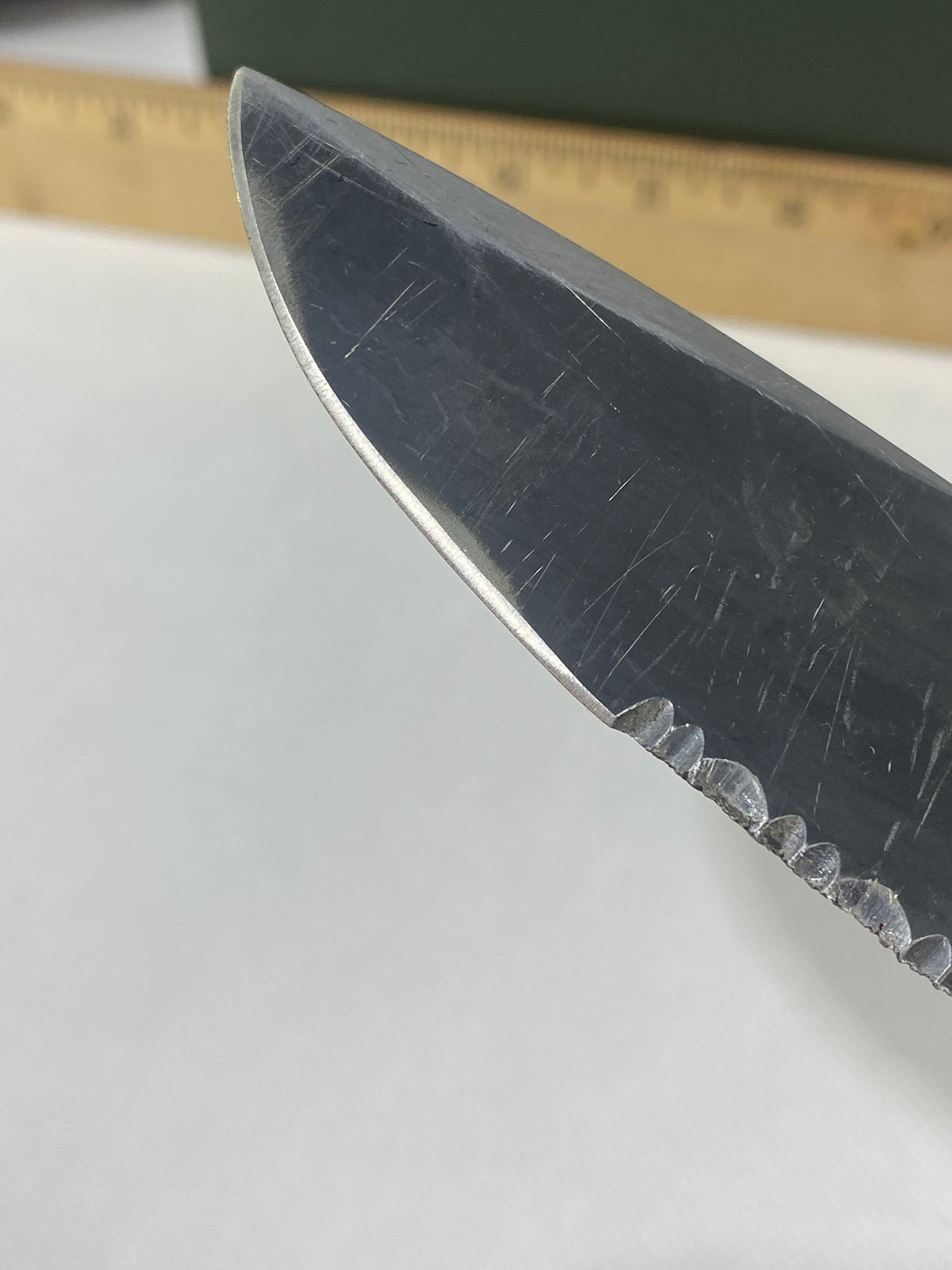 Gerber -85. 06. Light usage. Resharpened. A name is scratched into the blade. Needs Oil.