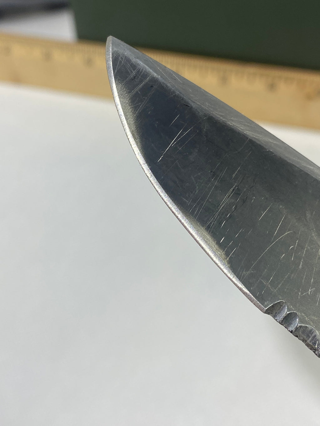 Gerber -85. 06. Light usage. Resharpened. A name is scratched into the blade. Needs Oil.