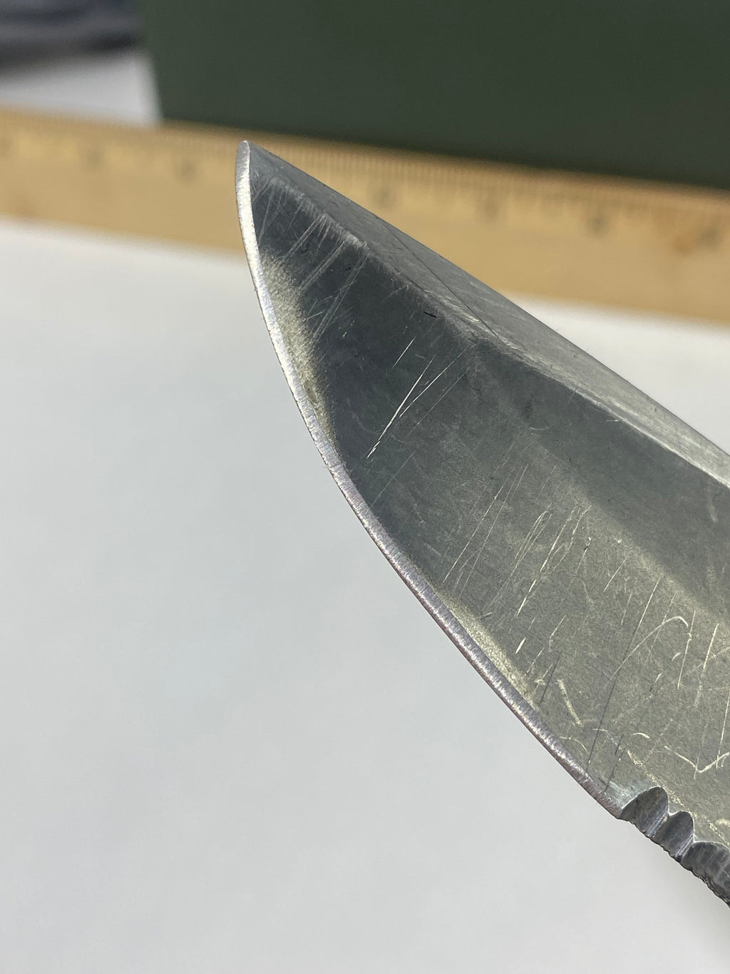 Gerber -85. 06. Light usage. Resharpened. A name is scratched into the blade. Needs Oil.