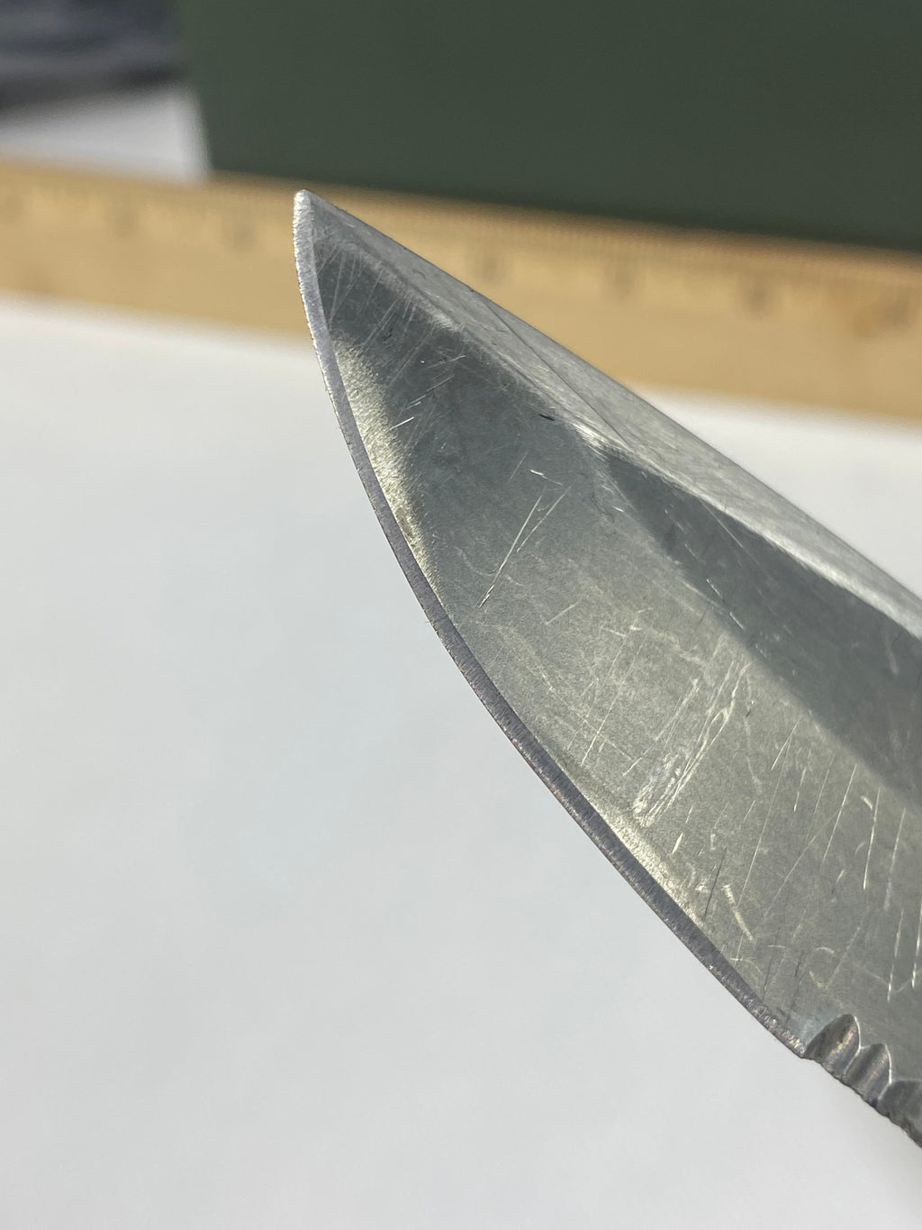 Gerber -85. 06. Light usage. Resharpened. A name is scratched into the blade. Needs Oil.