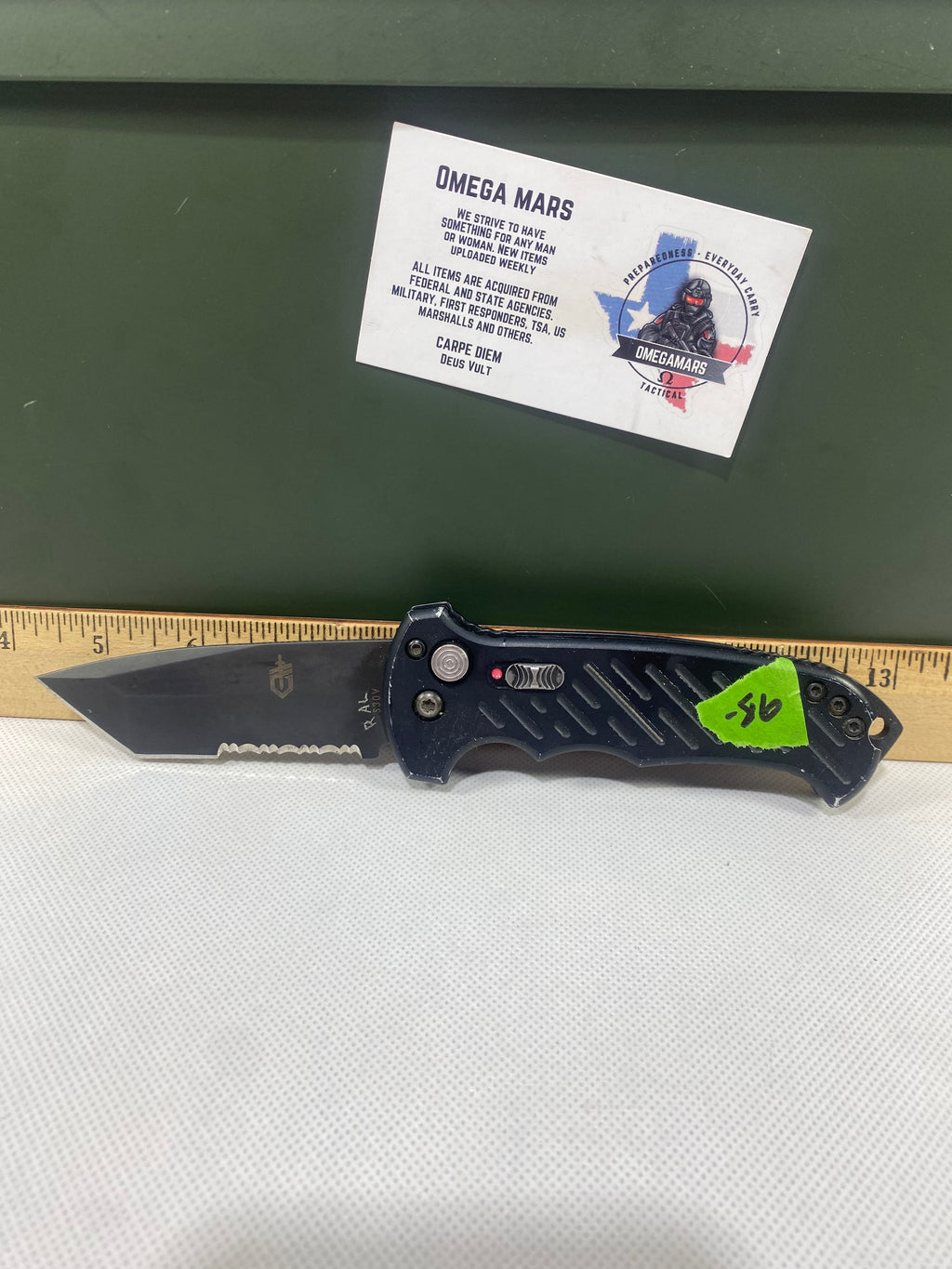 Gerber -86. 06. Light usage. Dings on blade. A name is scratched on the blade.