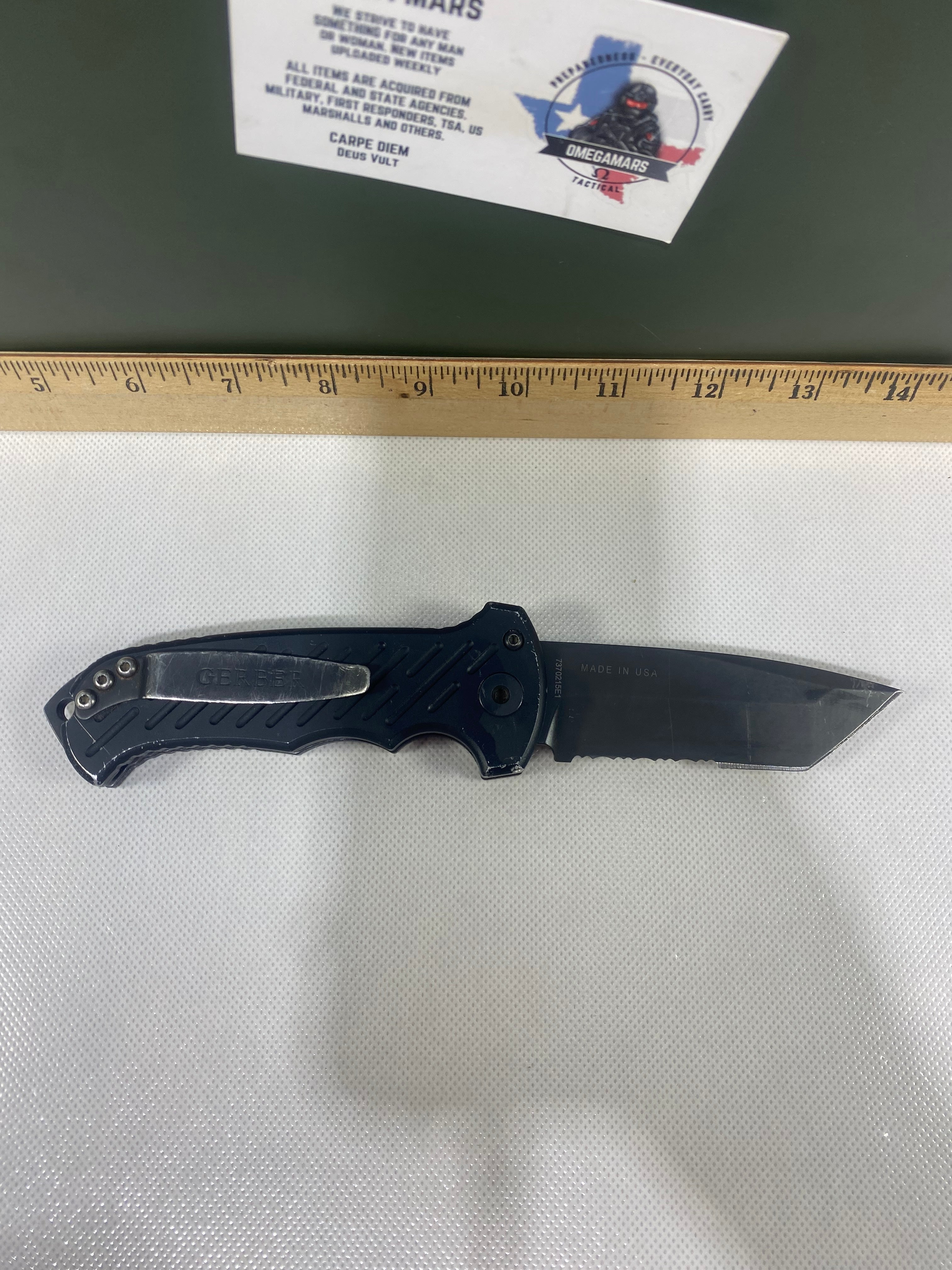 Gerber -86. 06. Light usage. Dings on blade. A name is scratched on the blade.