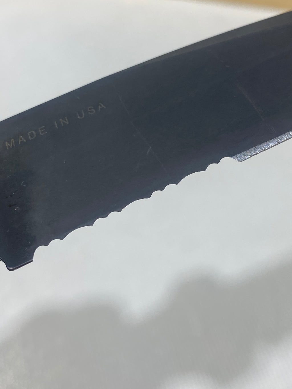 Gerber -86. 06. Light usage. Dings on blade. A name is scratched on the blade.