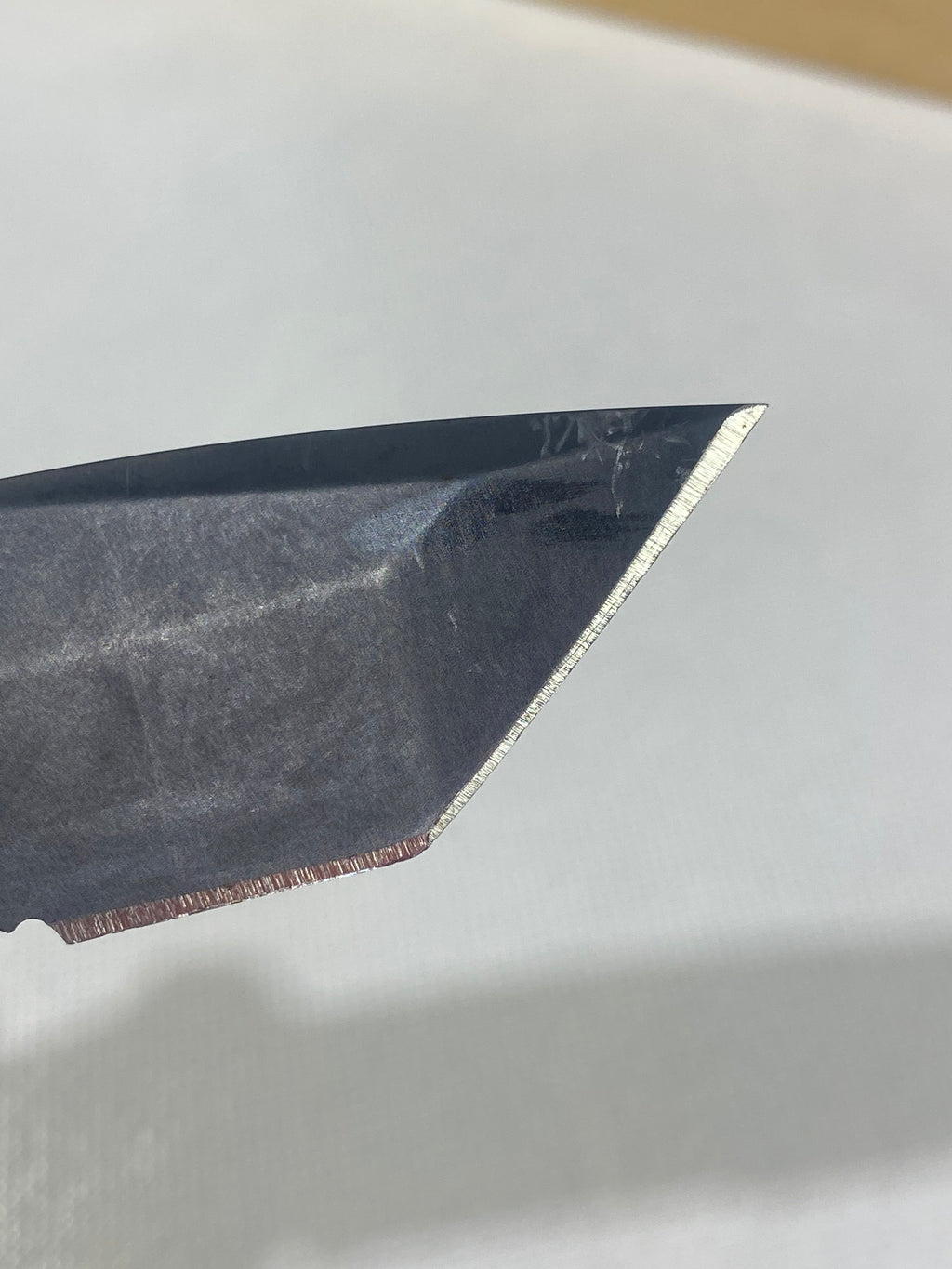 Gerber -86. 06. Light usage. Dings on blade. A name is scratched on the blade.