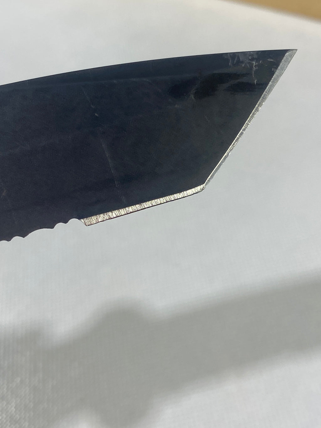 Gerber -86. 06. Light usage. Dings on blade. A name is scratched on the blade.
