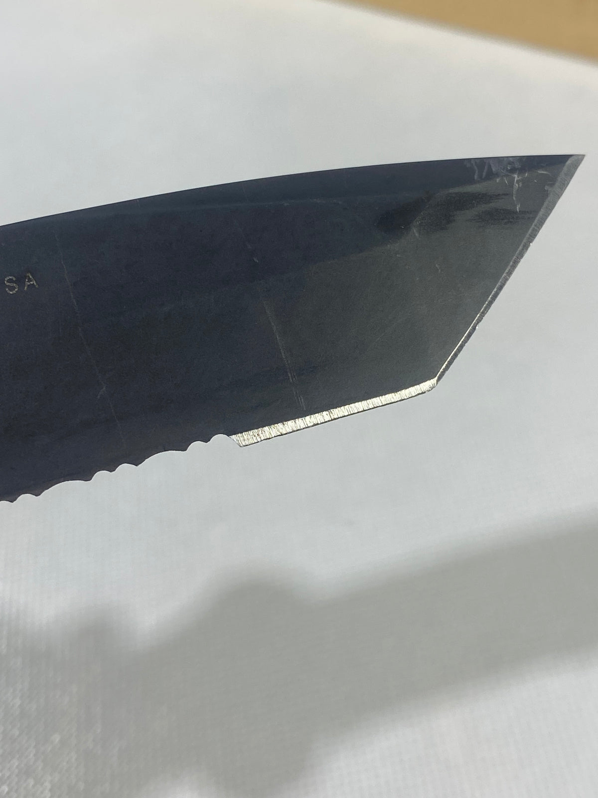 Gerber -86. 06. Light usage. Dings on blade. A name is scratched on the blade.