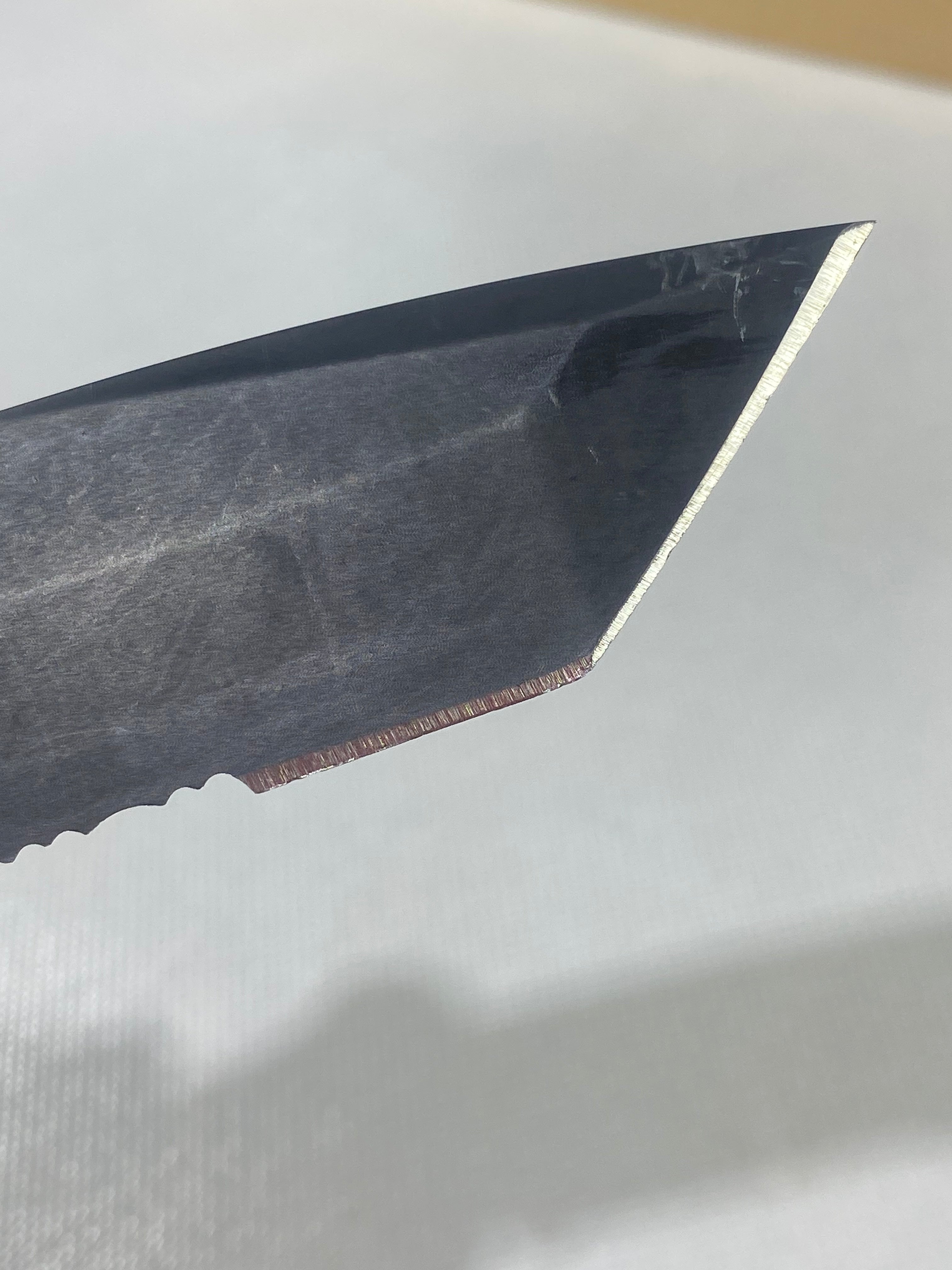Gerber -86. 06. Light usage. Dings on blade. A name is scratched on the blade.