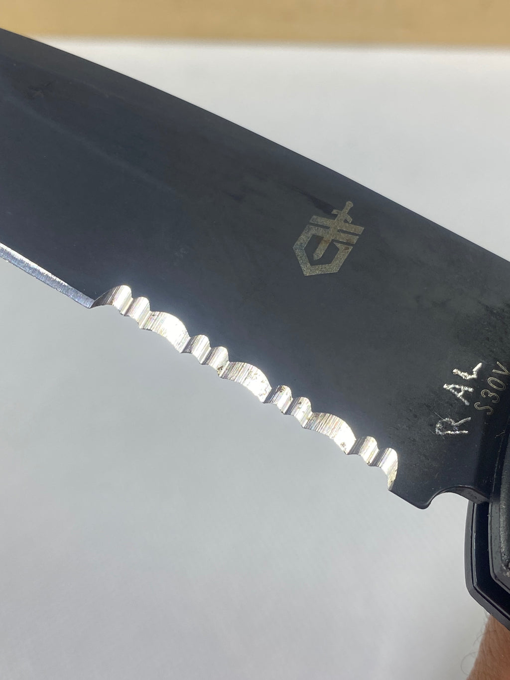 Gerber -86. 06. Light usage. Dings on blade. A name is scratched on the blade.