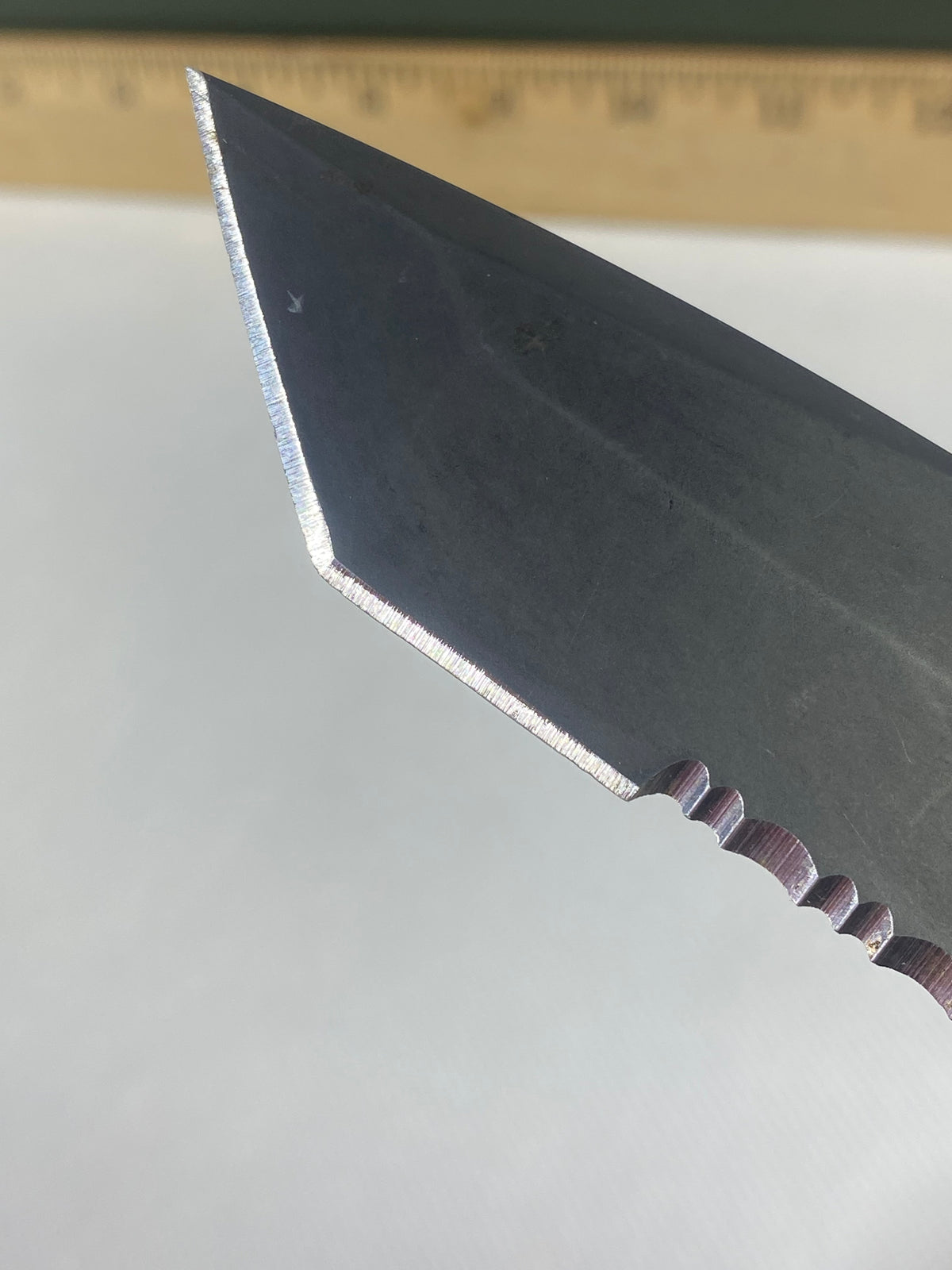 Gerber -86. 06. Light usage. Dings on blade. A name is scratched on the blade.