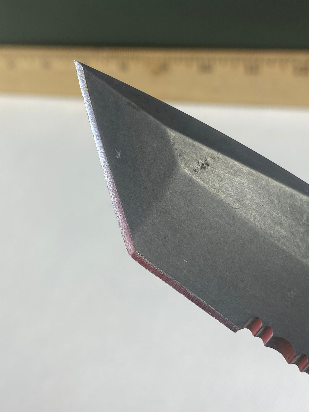 Gerber -86. 06. Light usage. Dings on blade. A name is scratched on the blade.