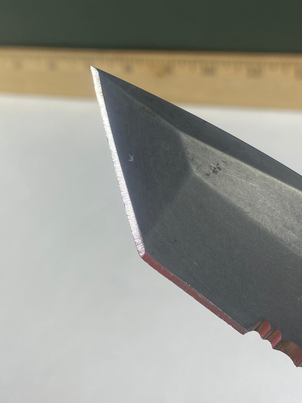Gerber -86. 06. Light usage. Dings on blade. A name is scratched on the blade.