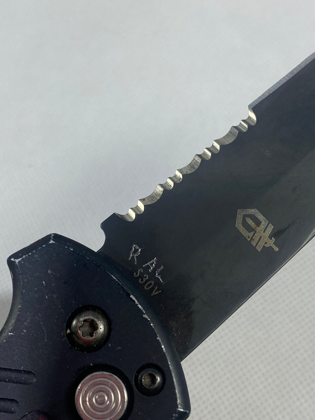 Gerber -86. 06. Light usage. Dings on blade. A name is scratched on the blade.