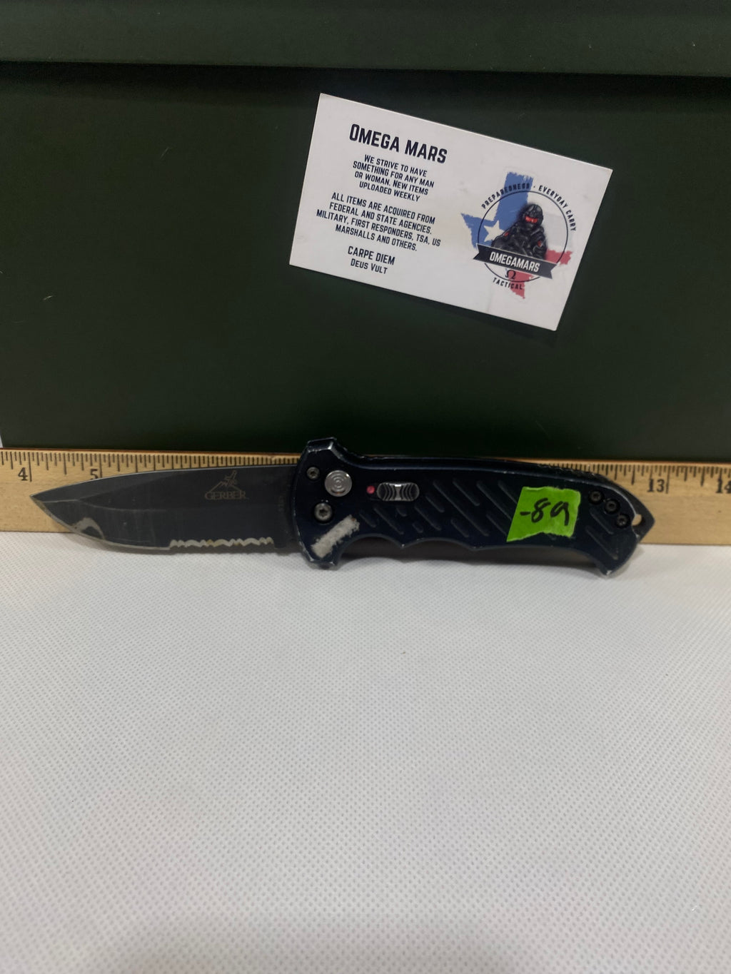 Gerber -89. 06. Light usage. Resharpened. Possible rust. Handle scratched. Dirty.