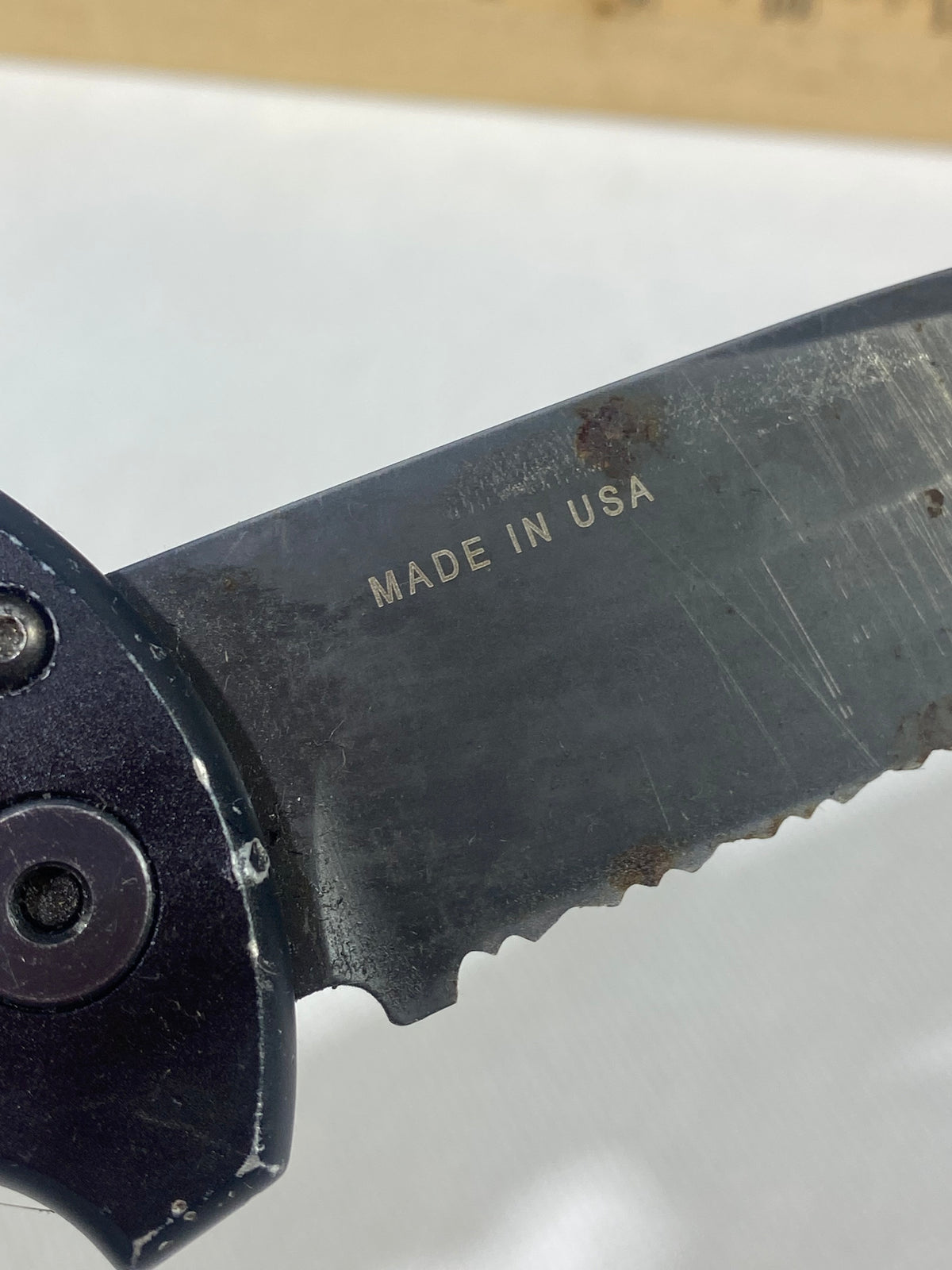 Gerber -89. 06. Light usage. Resharpened. Possible rust. Handle scratched. Dirty.