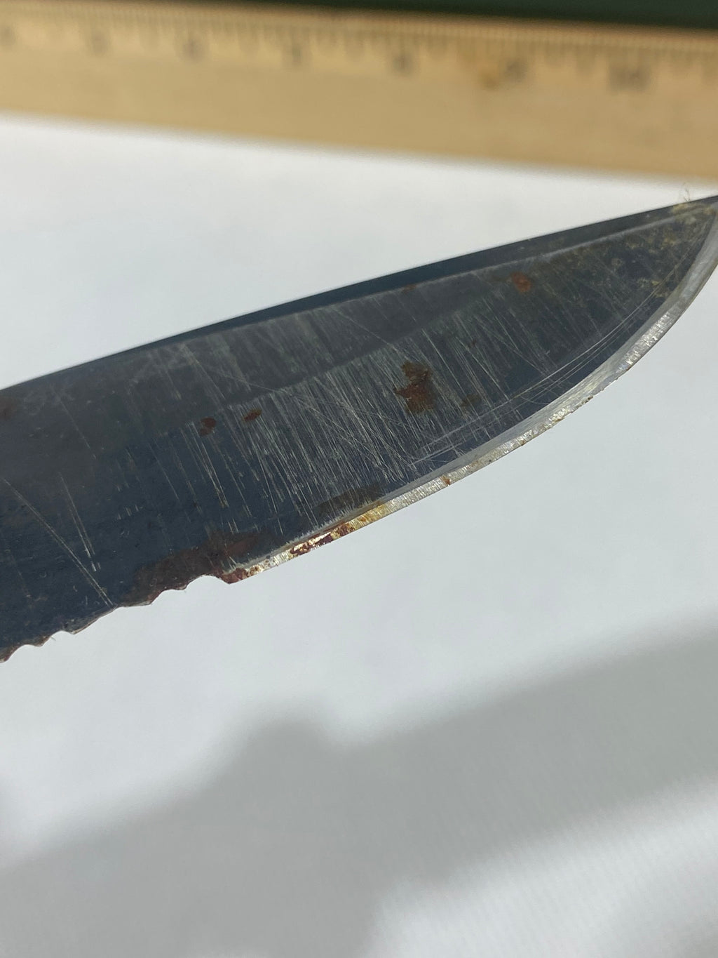 Gerber -89. 06. Light usage. Resharpened. Possible rust. Handle scratched. Dirty.