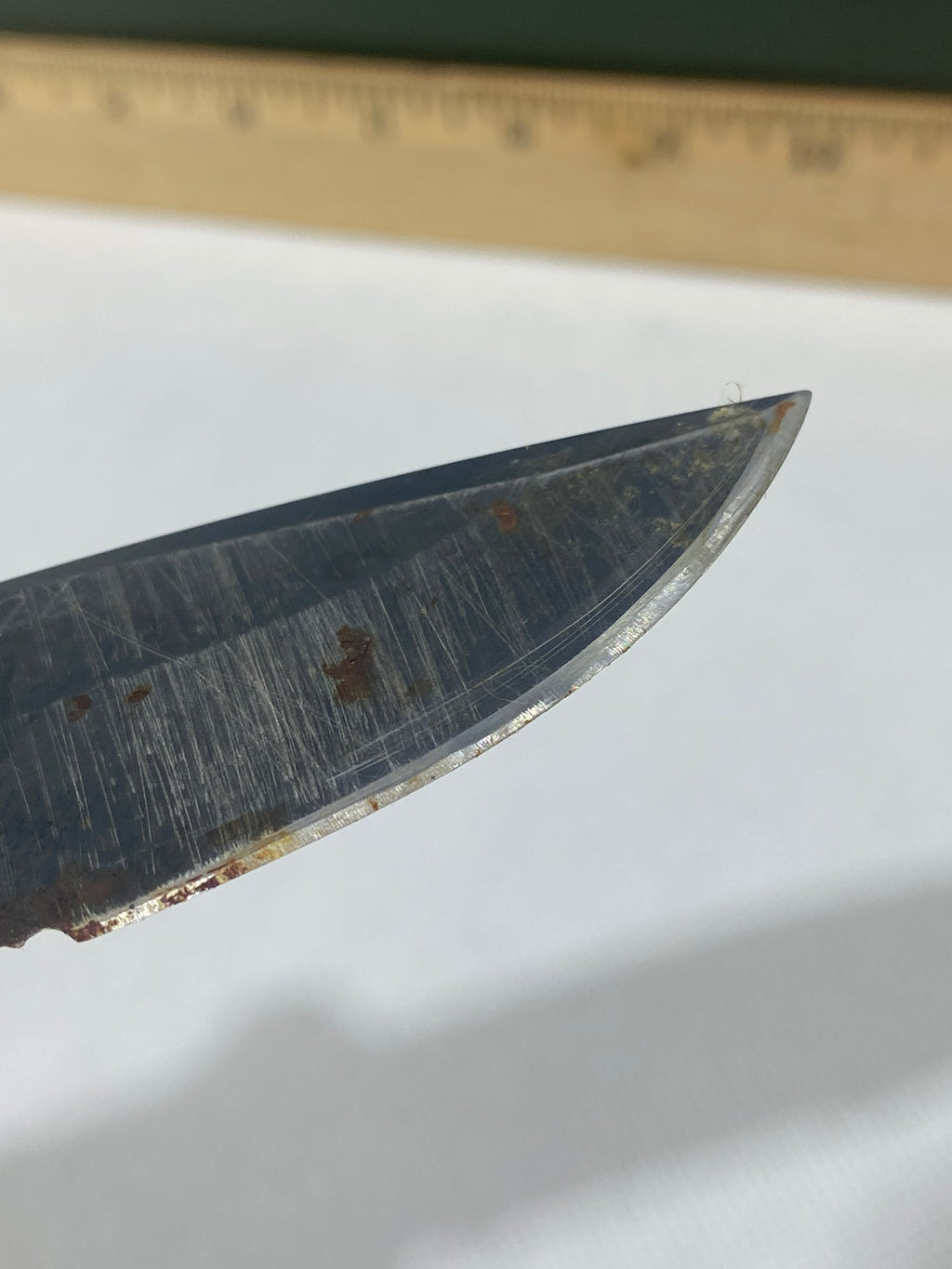 Gerber -89. 06. Light usage. Resharpened. Possible rust. Handle scratched. Dirty.
