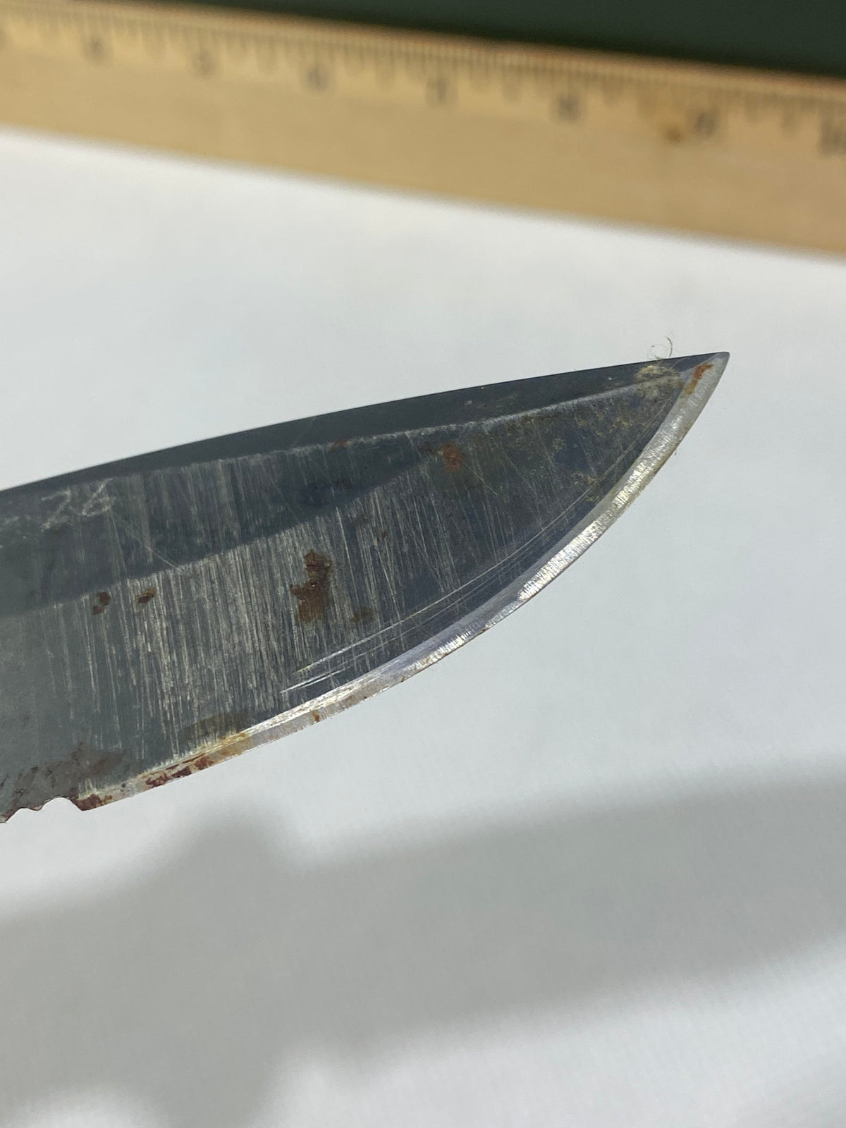 Gerber -89. 06. Light usage. Resharpened. Possible rust. Handle scratched. Dirty.