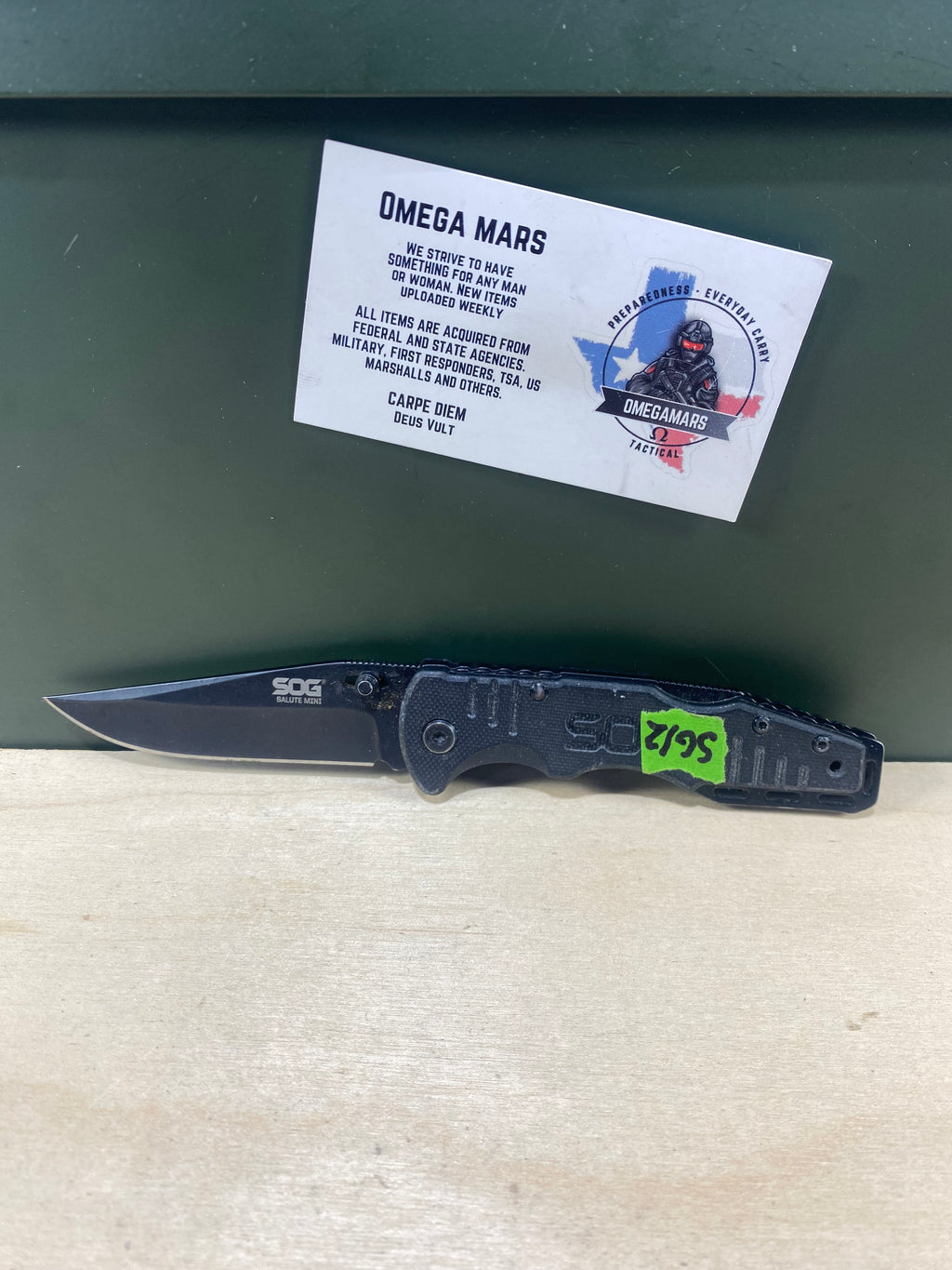 SOG Salute Mini #SG12.  Light Usage. Little dirty. Resharpened.