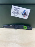 SOG Salute Mini #SG12.  Light Usage. Little dirty. Resharpened.