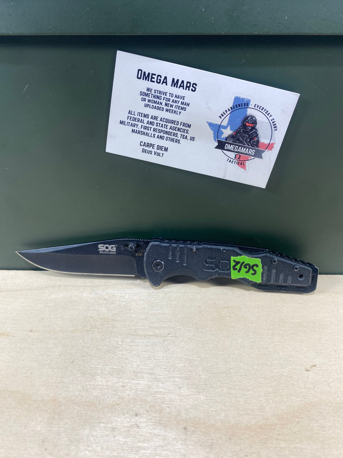 SOG Salute Mini #SG12.  Light Usage. Little dirty. Resharpened.