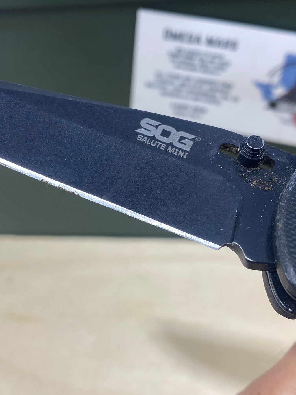 SOG Salute Mini #SG12.  Light Usage. Little dirty. Resharpened.