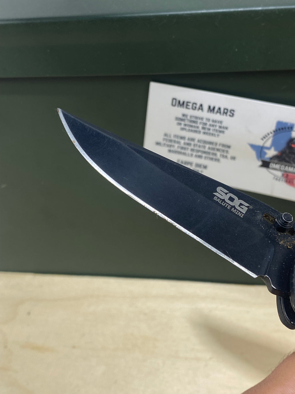 SOG Salute Mini #SG12.  Light Usage. Little dirty. Resharpened.