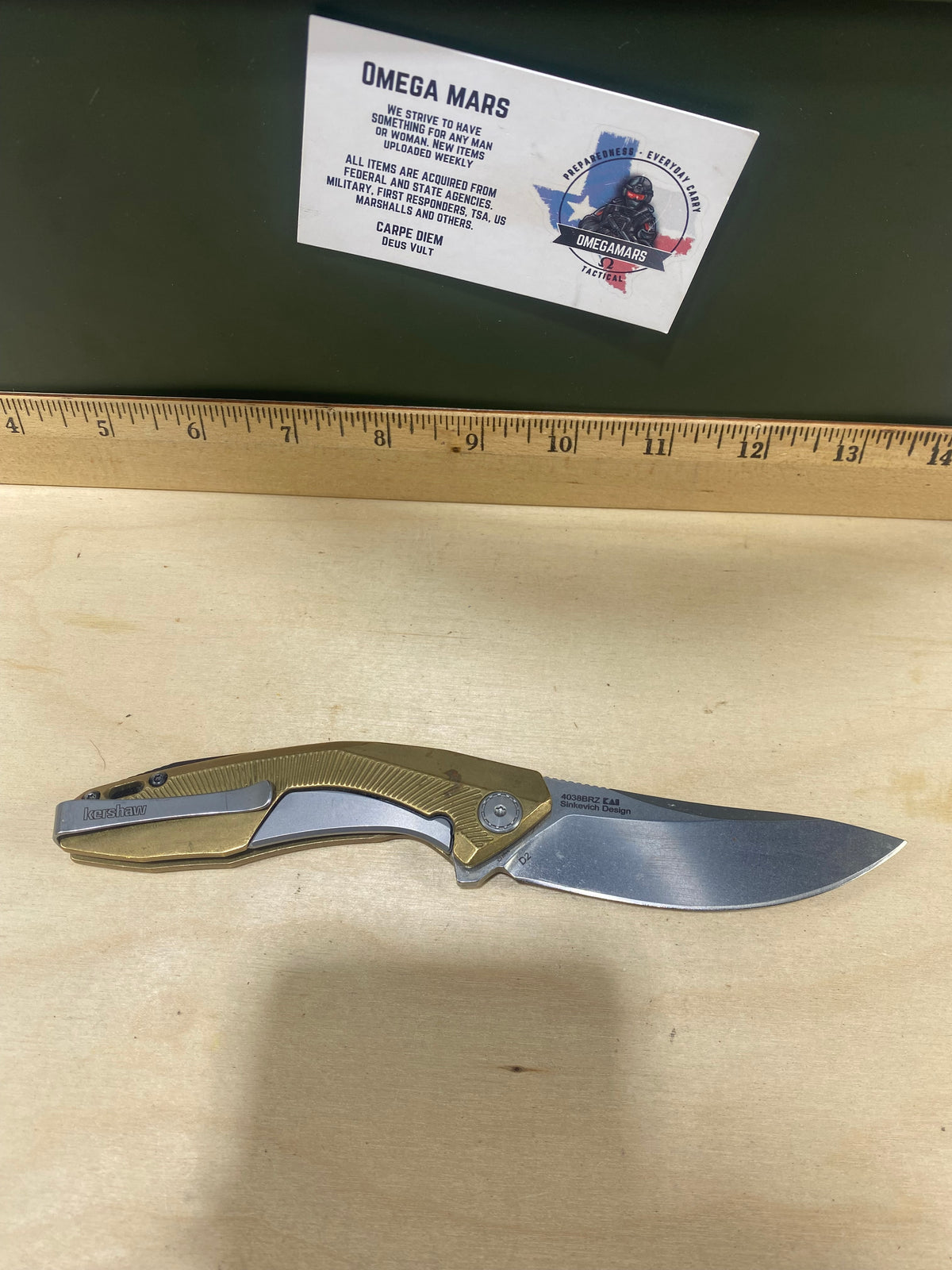Kershaw Tumbler-Brass 4038BRZ #79. Light Usage.