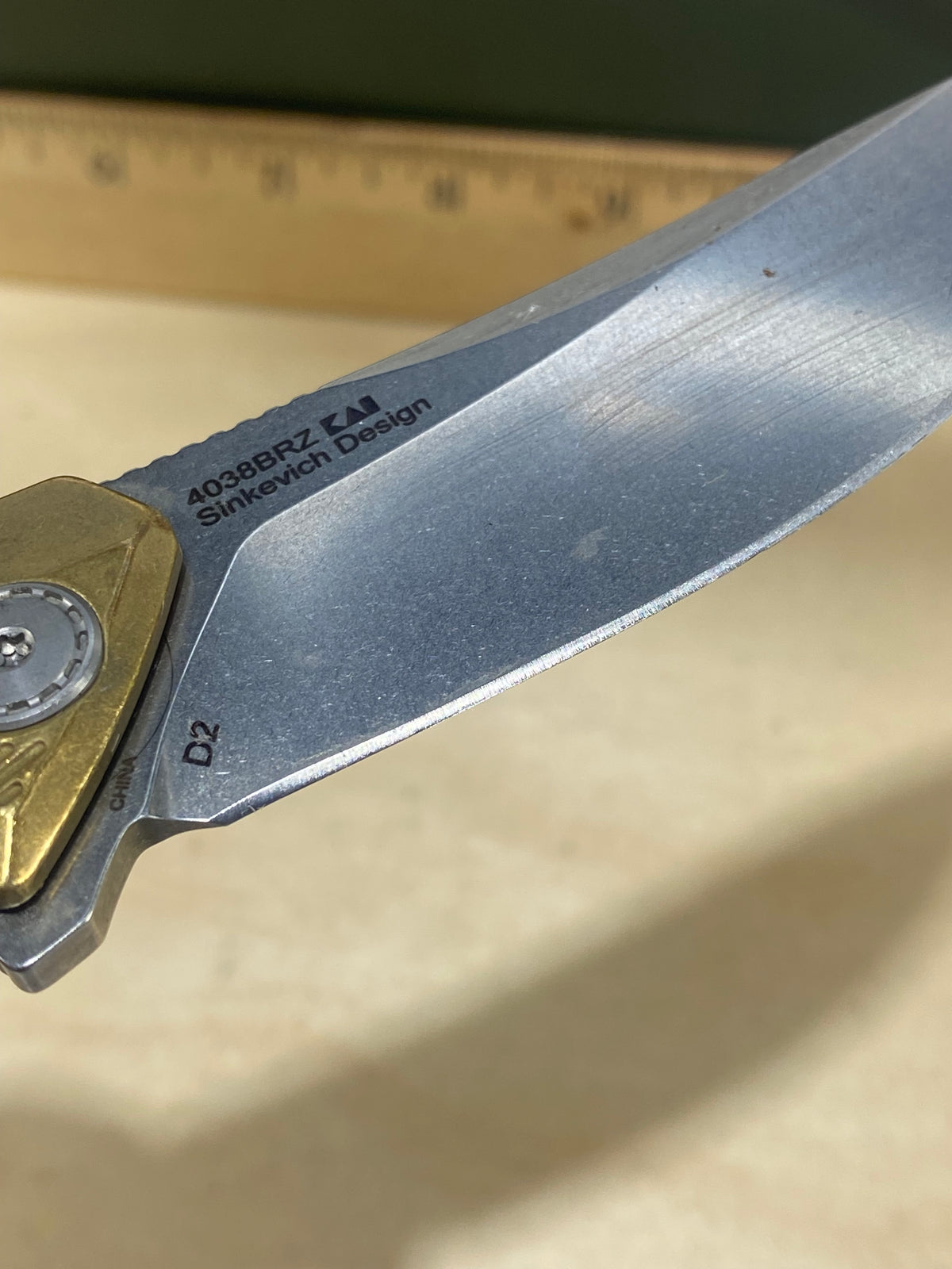 Kershaw Tumbler-Brass 4038BRZ #79. Light Usage.